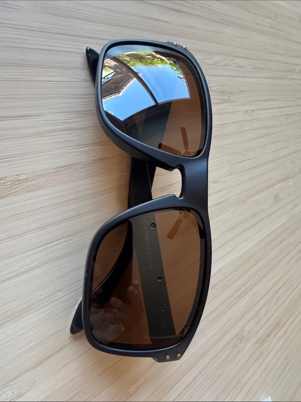 Oakley Black Sunglasses with Red Stripe and Gold Hardware